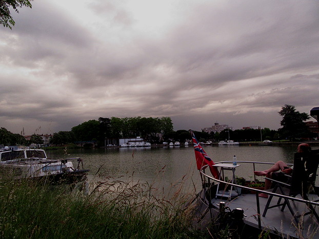 Agen contemplating storm clouds